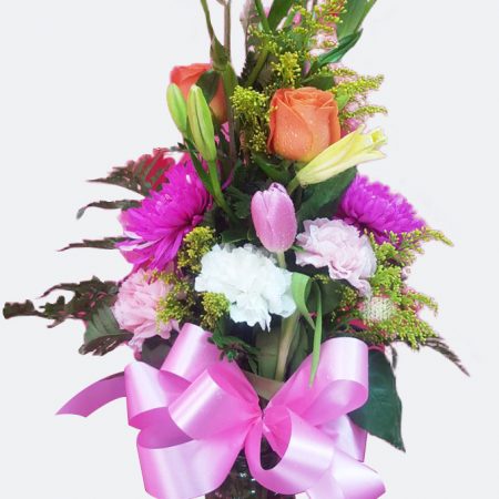 Mix flowers in thin vase