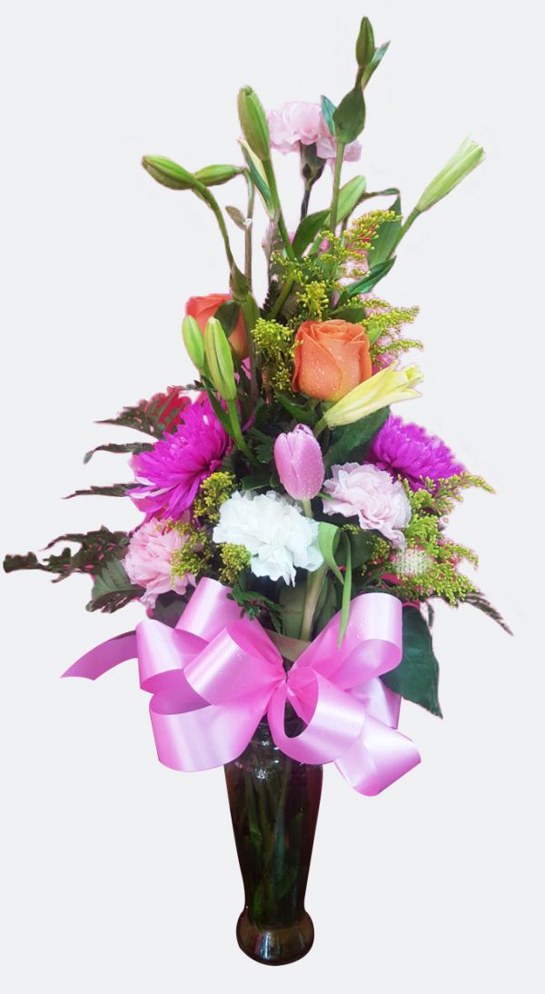 Mix flowers in thin vase