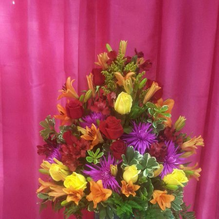 Tropical flowers in squared vase