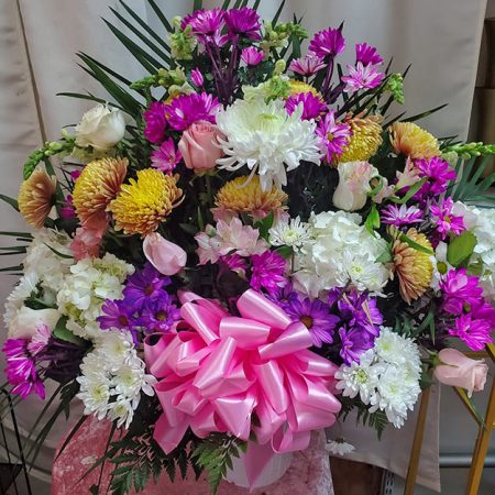 Multi shades of pink funeral basket