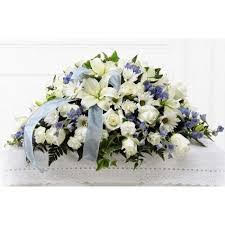 White and blue casket cover