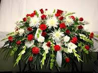 Red and white casket cover