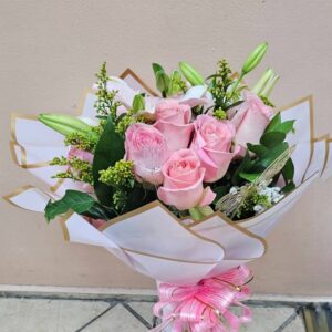 Bunch of lilies and pink roses